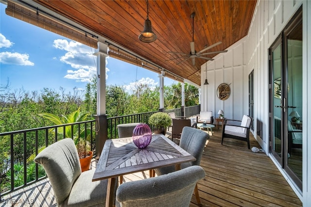 wooden deck with ceiling fan