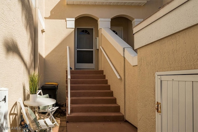 stairway with decorative columns