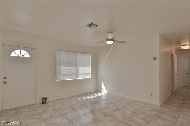 entryway featuring ceiling fan