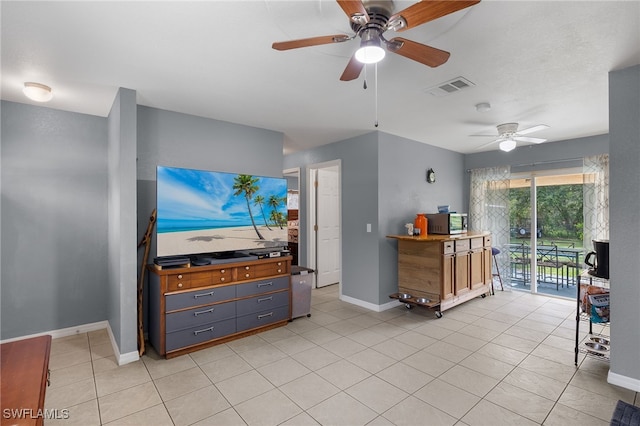 kitchen with ceiling fan and light tile patterned flooring