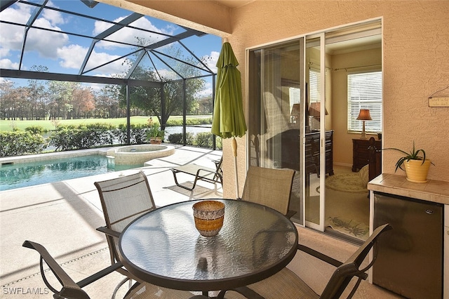 view of patio featuring a swimming pool with hot tub and glass enclosure