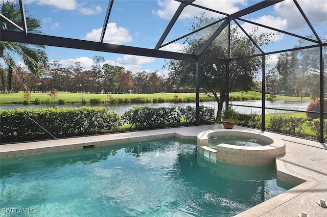 view of pool featuring a patio area, an in ground hot tub, a water view, and glass enclosure