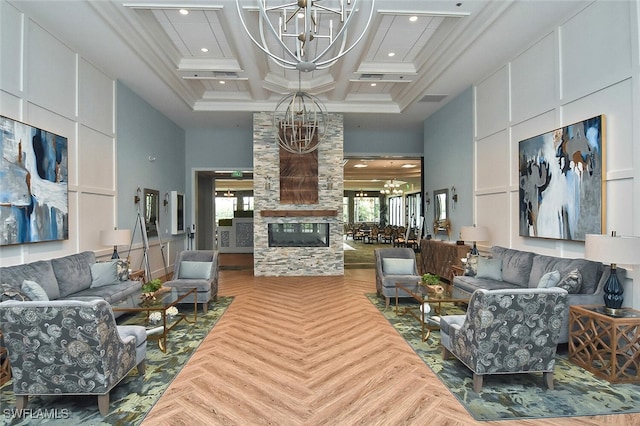 living room featuring crown molding, beamed ceiling, a high ceiling, a notable chandelier, and coffered ceiling