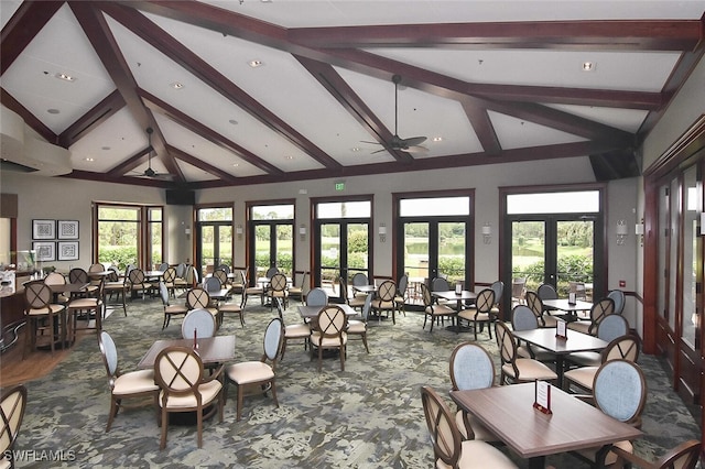 interior space featuring vaulted ceiling with beams and french doors