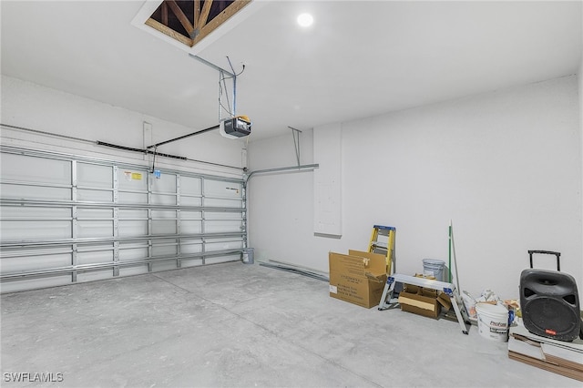 garage featuring a garage door opener