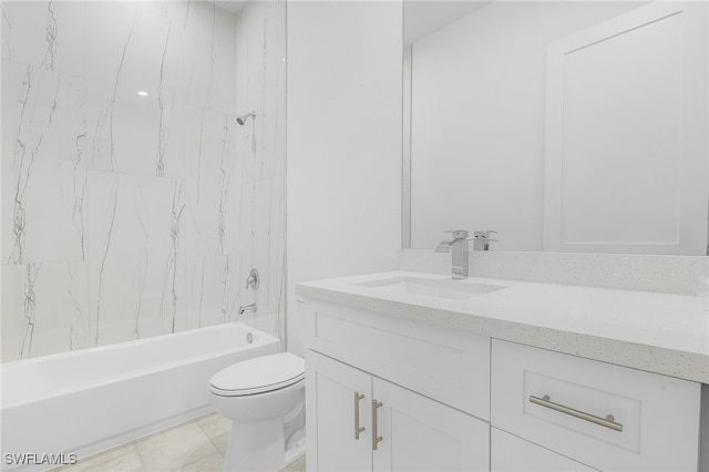 full bathroom featuring vanity, tiled shower / bath, toilet, and tile patterned floors