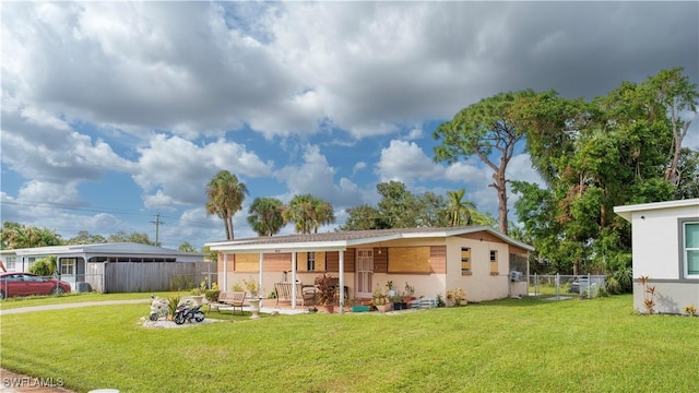 exterior space featuring a patio and a front yard