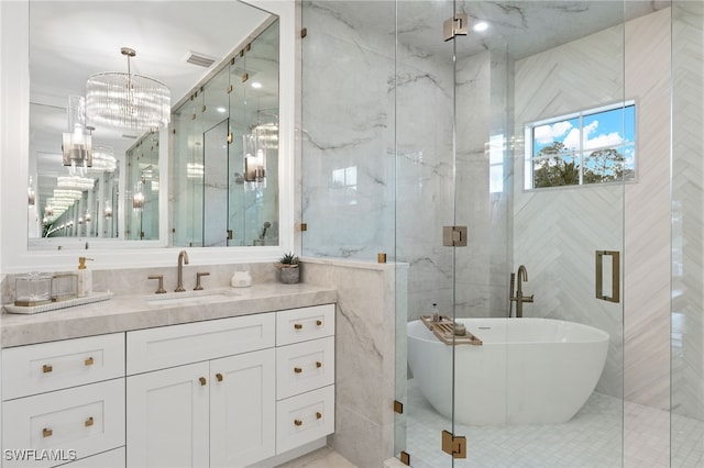 bathroom with vanity, tile walls, shower with separate bathtub, and tile patterned flooring