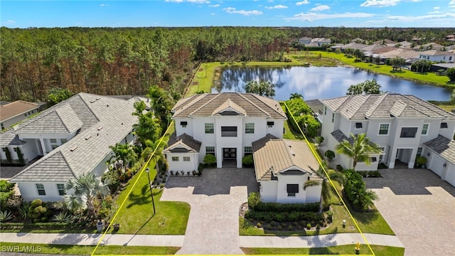 drone / aerial view featuring a water view