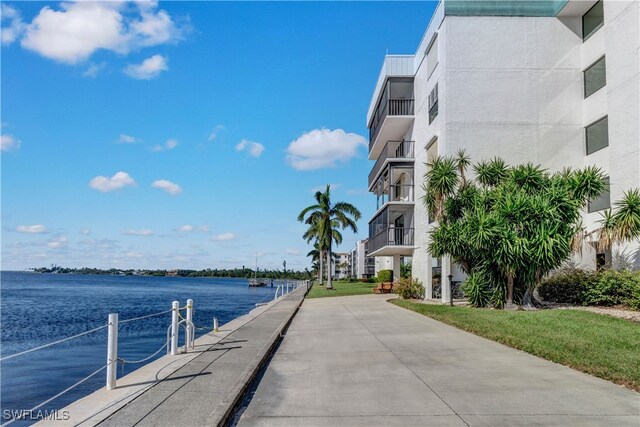 exterior space with a water view