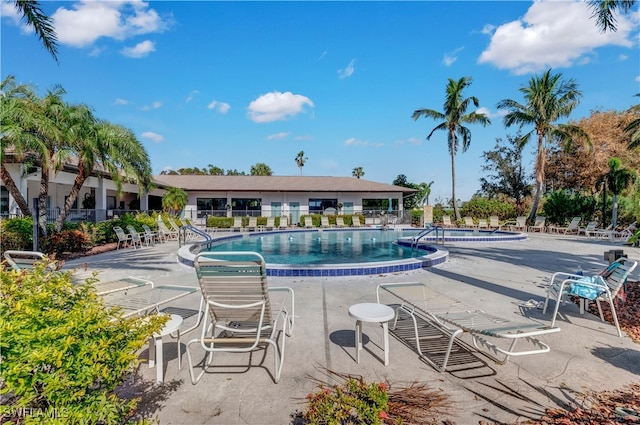 view of pool featuring a patio area