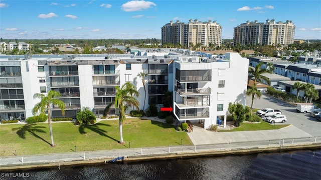 view of building exterior with a water view