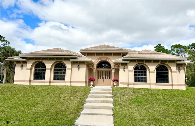 view of front of home with a front yard