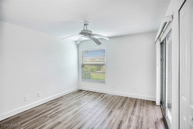 16251 Dublin Cir Unit F104, Fort Myers, FL 33908 - unfurnished bedroom with light wood-style floors, baseboards, and ceiling fan
