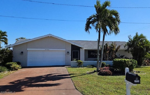 single story home with a garage and a front lawn