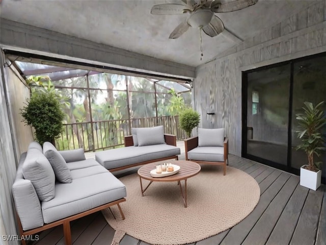 sunroom featuring ceiling fan