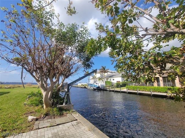 property view of water featuring a dock