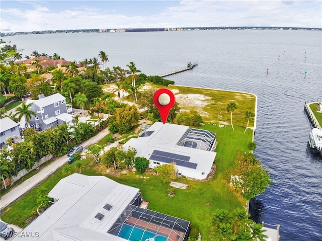 birds eye view of property featuring a water view