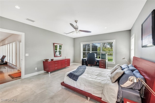 bedroom featuring light hardwood / wood-style flooring and ceiling fan