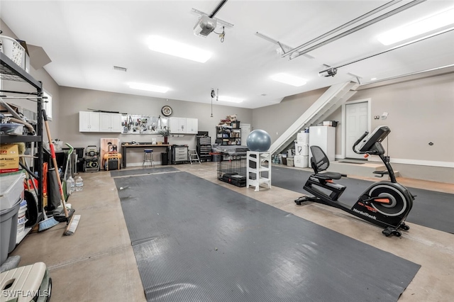 workout area featuring a workshop area and concrete floors