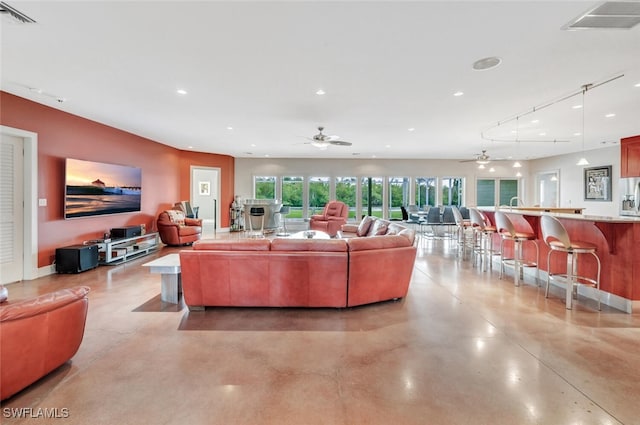 living room with ceiling fan