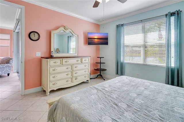 bedroom with ceiling fan, light tile patterned flooring, ornamental molding, and multiple windows