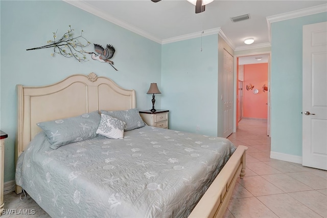 bedroom featuring crown molding, light tile patterned floors, and ceiling fan