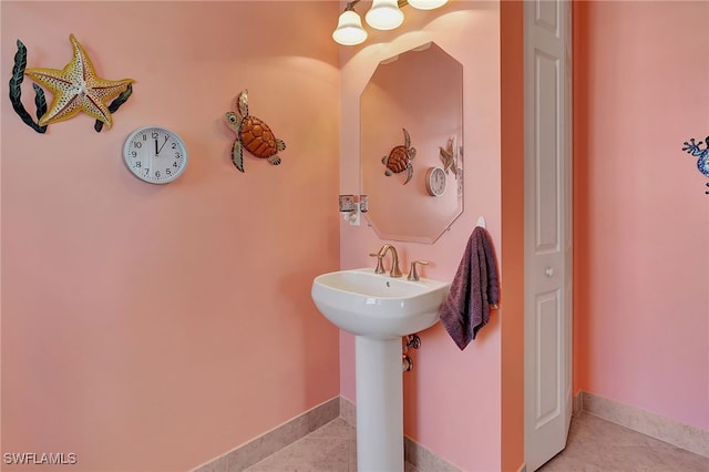 bathroom with tile patterned flooring