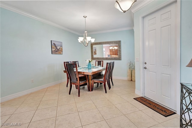 dining room featuring ornamental molding, light tile patterned flooring, and a notable chandelier