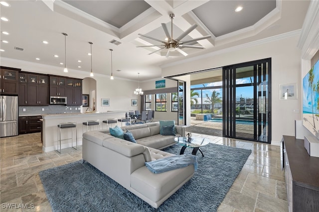 living room with crown molding, beam ceiling, and coffered ceiling