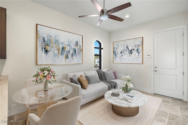 living room featuring ceiling fan