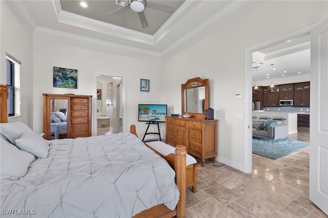 bedroom featuring connected bathroom, ceiling fan, crown molding, and a high ceiling