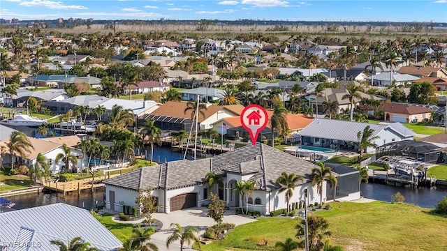 bird's eye view with a water view