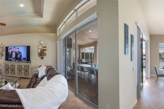 tiled living room with vaulted ceiling