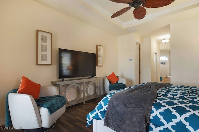 bedroom with dark hardwood / wood-style flooring, ornamental molding, a raised ceiling, and ceiling fan