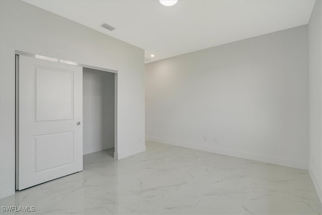 unfurnished bedroom featuring a closet