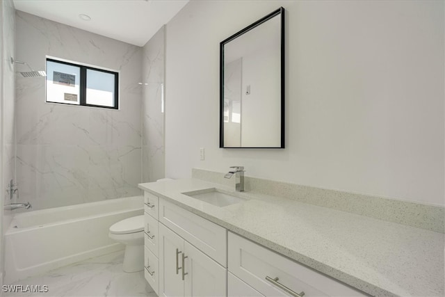 full bathroom with toilet, tiled shower / bath combo, and vanity