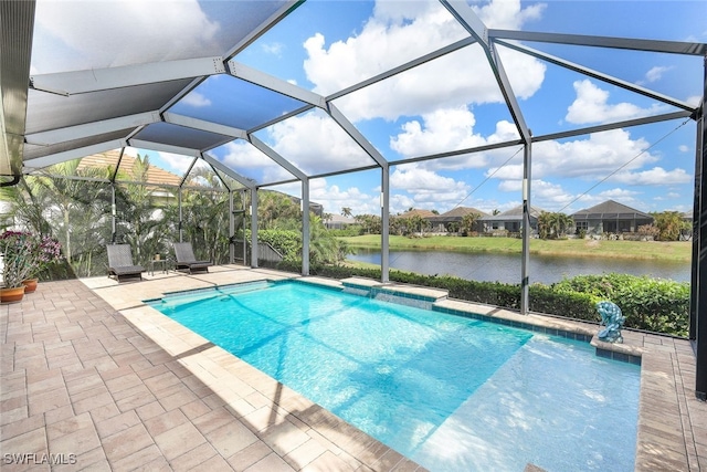 view of pool with glass enclosure, a water view, and a patio