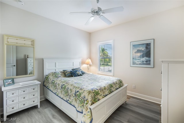 bedroom featuring hardwood / wood-style flooring and ceiling fan