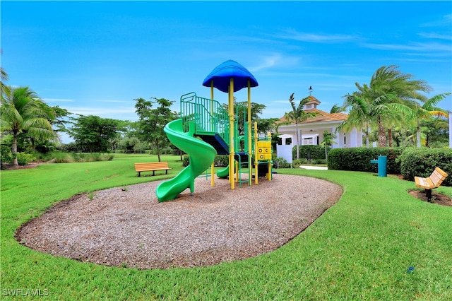 view of playground featuring a lawn