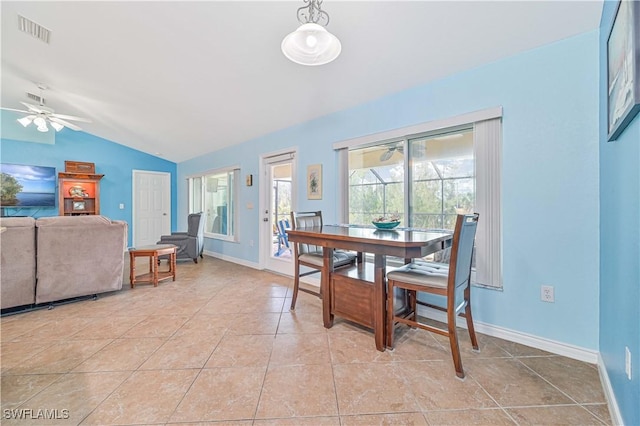 3922 NE 23rd Pl, Cape Coral, FL 33909 - dining area with light tile patterned floors, lofted ceiling, a ceiling fan, and visible vents