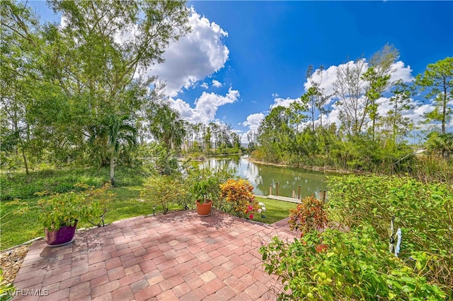 view of patio featuring a water view