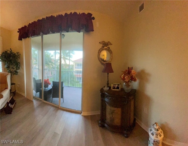 doorway to outside featuring hardwood / wood-style floors