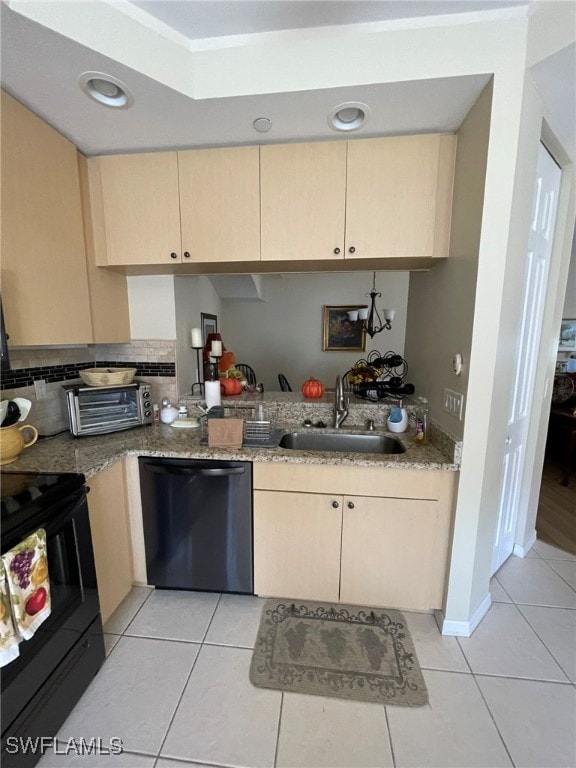 kitchen featuring sink, decorative backsplash, light brown cabinetry, light tile patterned floors, and black appliances