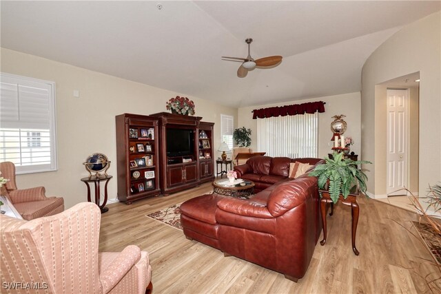 1105 Van Loon Commons Cir Unit 301, Cape Coral, FL 33909 - living area with ceiling fan, lofted ceiling, wood finished floors, and baseboards
