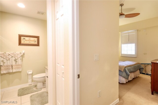 1105 Van Loon Commons Cir Unit 301, Cape Coral, FL 33909 - bathroom featuring toilet, a ceiling fan, vanity, and baseboards