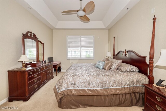 1105 Van Loon Commons Cir Unit 301, Cape Coral, FL 33909 - bedroom with multiple windows, light colored carpet, and a tray ceiling