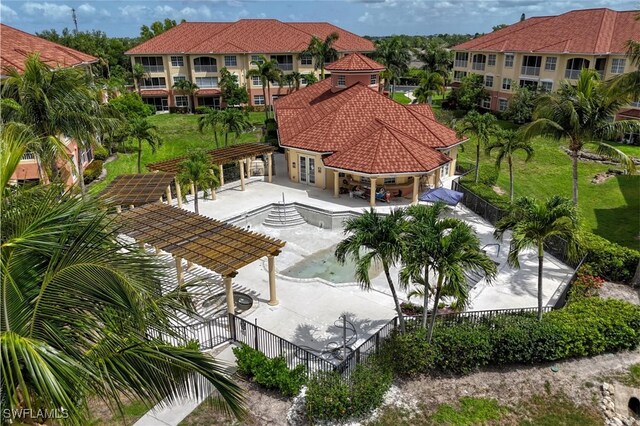 1105 Van Loon Commons Cir Unit 301, Cape Coral, FL 33909 - view of pool featuring a fenced backyard, a pergola, french doors, and a patio area