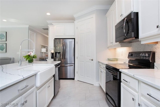 kitchen featuring ornamental molding, dishwashing machine, stainless steel fridge, black electric range oven, and white cabinetry