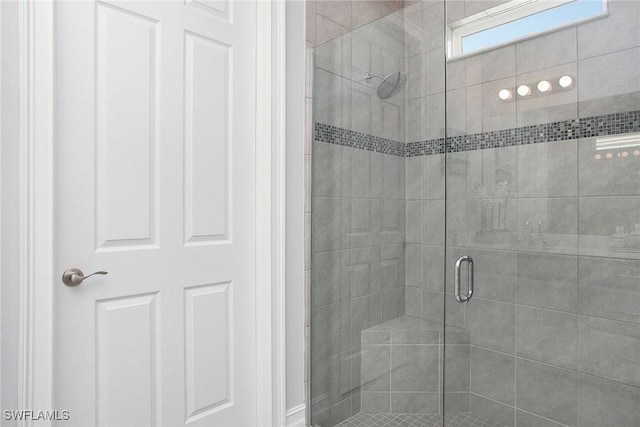 bathroom with a stall shower